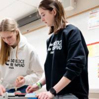 participants working with laser lights